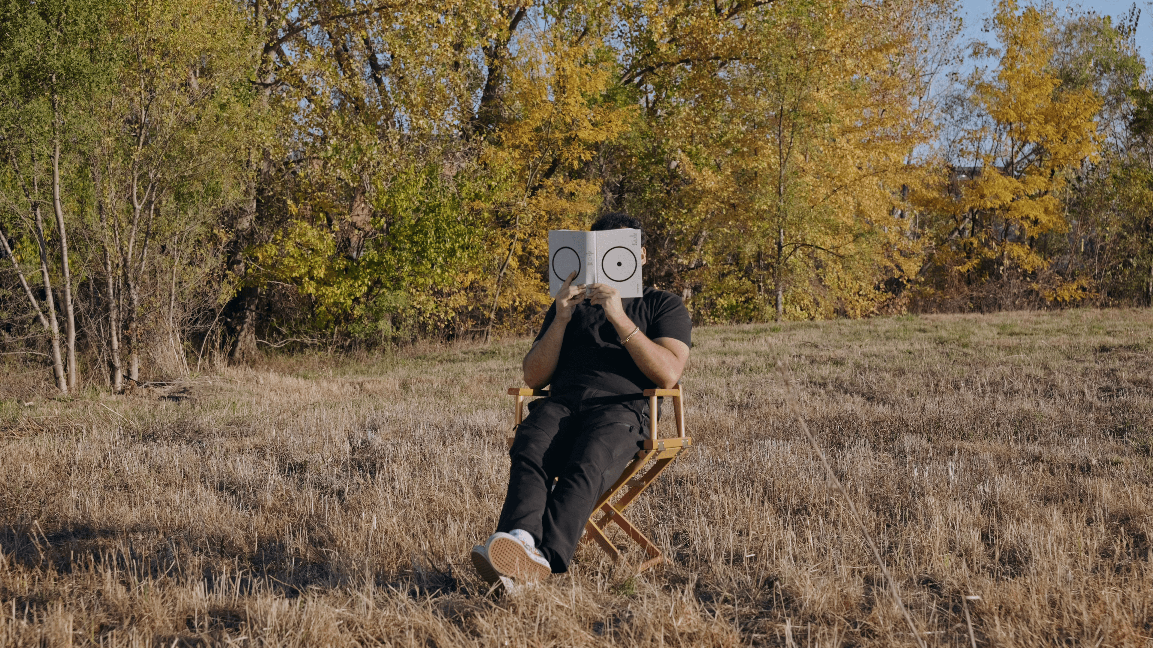 Picture of a person holding a book